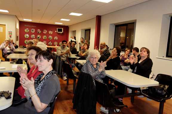 Spectators applauding the choir