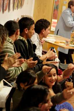 Spectators enjoying the energetic dance display
