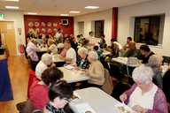 The audience tuck into pie & peas