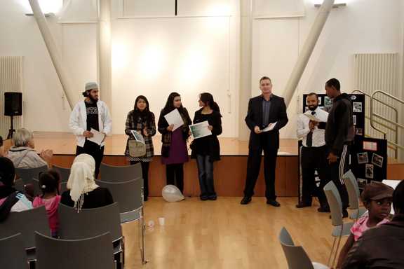 Young people being presented with their awards