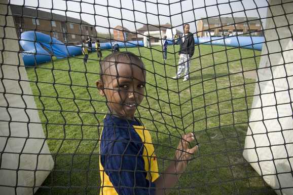 Abdimajid plays football