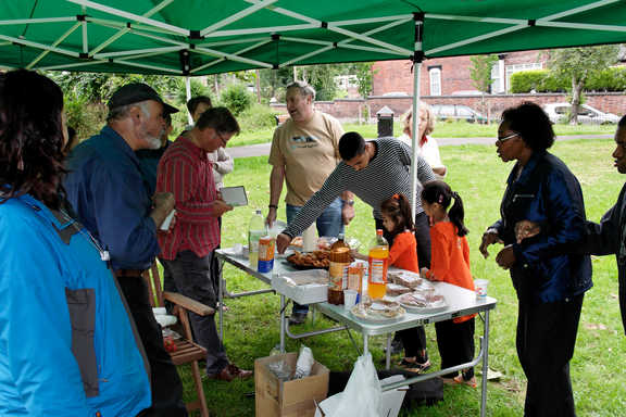Enjoying food at the event.
