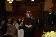 Nasira Amin walks to the stage