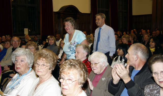 Roger and Anne Sheldon make their way to the stage