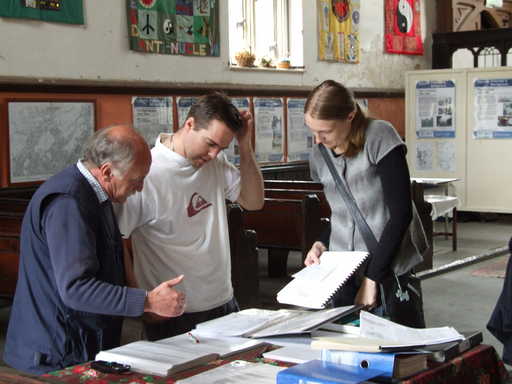 Visitors looking at records
