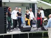 SOSA-XA! singing group on stage