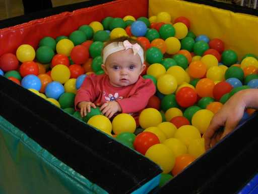 Baby in ball pit