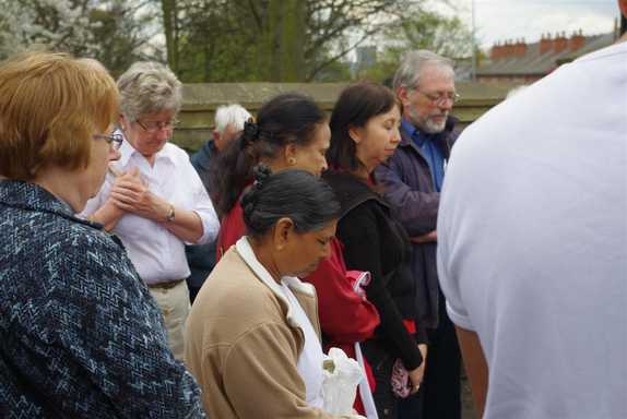 Walkers stop and pray