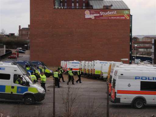 Police vehicles at demo