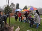 Sure Start Nursery Pupils Helping Plant