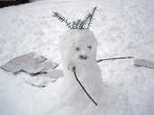 A curly-headed snowman