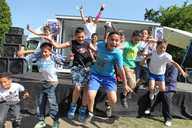 Boys jump off the stage