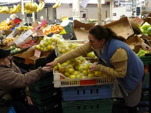 Customer buying fuit and veg