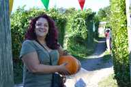 A proud pumpkin grower at Allotment Soup
