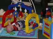 Toddler on a play mat