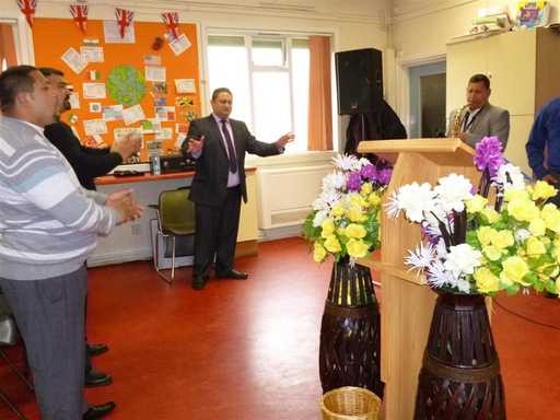 Pastor Pavol Sandor leads the congregation.