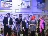 An act performs on stage