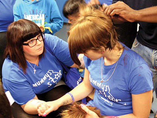 ...During the head shaving process...