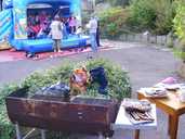 Barbeque and bouncy castle at Carwood TARA relaunch party