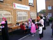 Children queuing for face painting at Carwood TARA relaunch party
